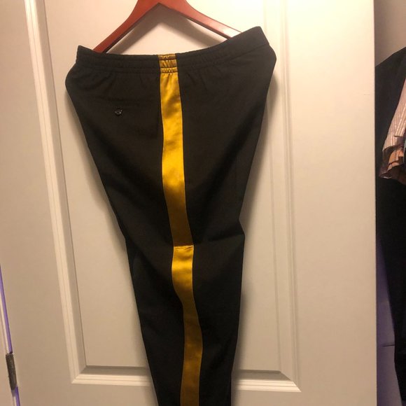 Alexander McQueenBlack/Mustard dress pants.